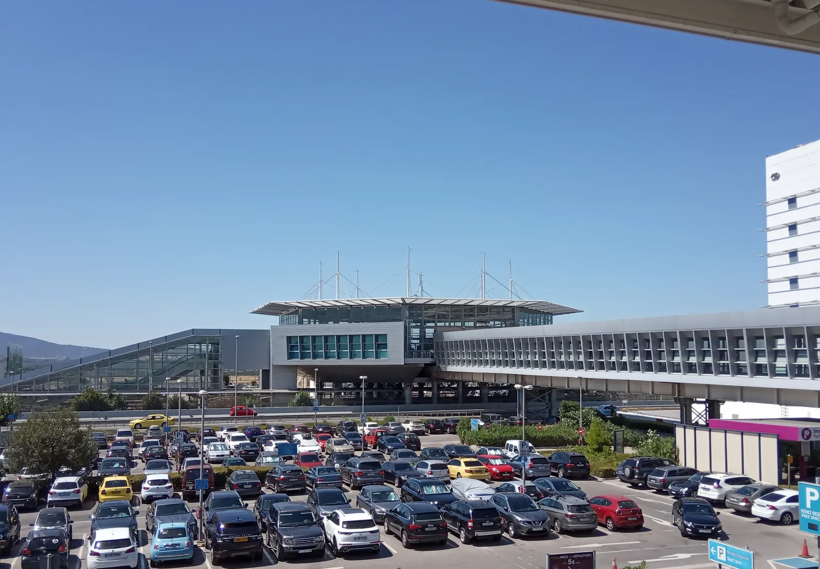 Athens International Airport terminal seen from the airport train station area