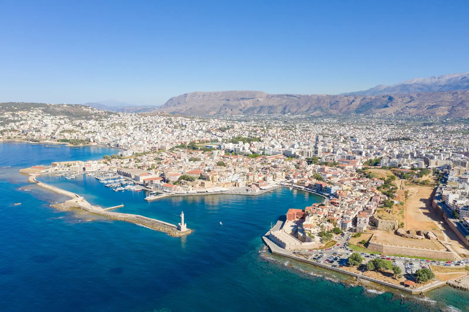 Aerial view of the Venetian harbor and lighthouse in Chania, Crete